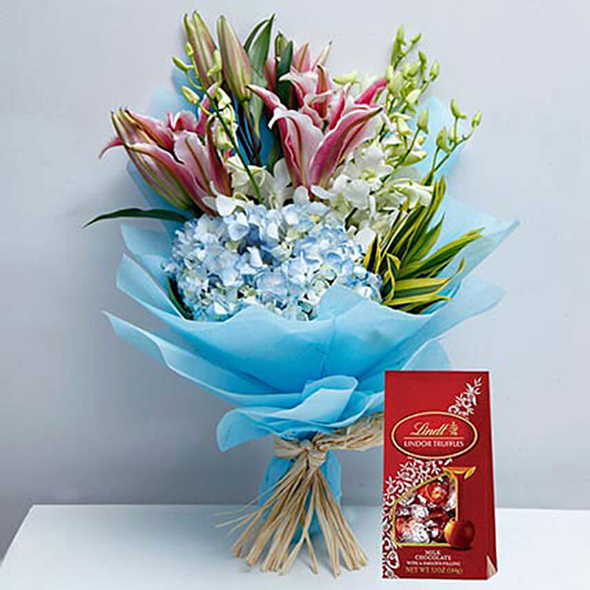 Delicate Flowers and Lindt Chocolate Combo: Flowers N Chocolates 