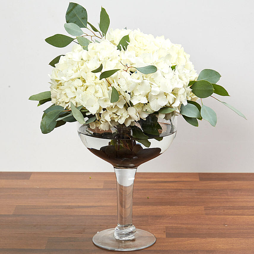 Hydrangeas In Clear Wine Glass Vase: Gifts for Employess