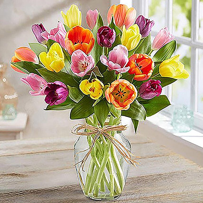Colourful Tulips In Glass Vase: Congratulations Flowers Singapore